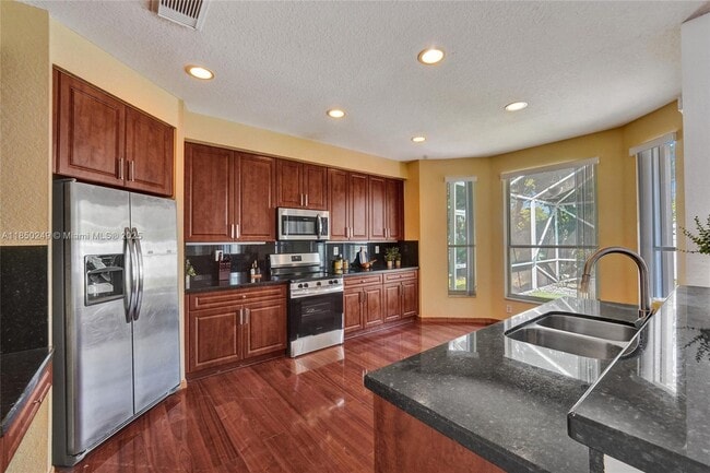 Building Photo - 10730 NW 56th Ct