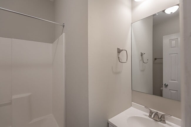 Building Photo - Like New Home off Freeman Mill.  Just Painted, New Wood/Vinyl Flooring, Vaulted Ceilings, Front P...