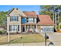 Building Photo - Fully Furnished 4 Bedroom with Internet Included!