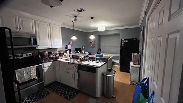 Kitchen with stainless appliances - 305 Archers Mead