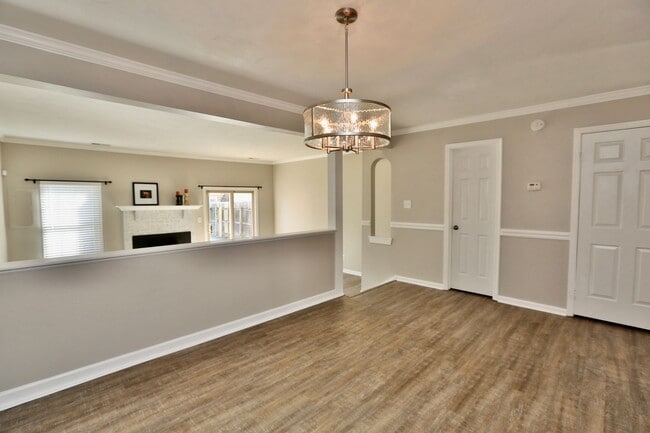 Building Photo - Updated End-Unit Brick Townhome Ready NOW!...