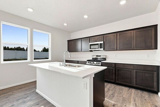 Building Photo - Spacious 5-Bedroom with Loft with 3-Car Garage