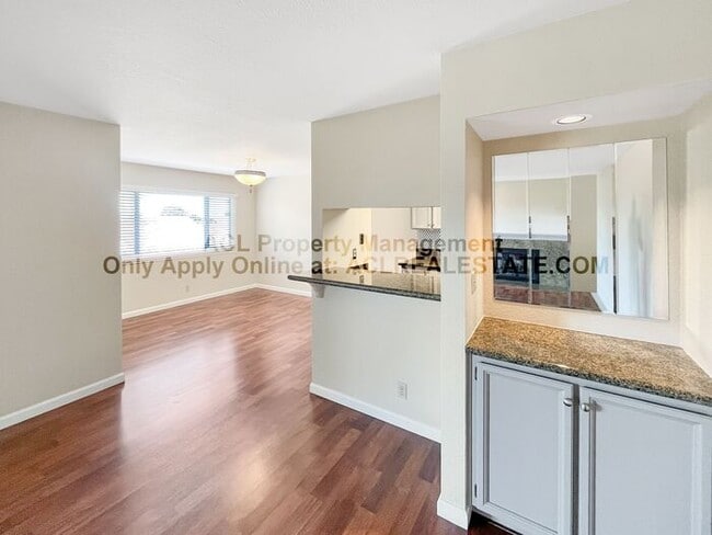 Building Photo - Bright 2BR/2BA Condo with Garage & Pool in...