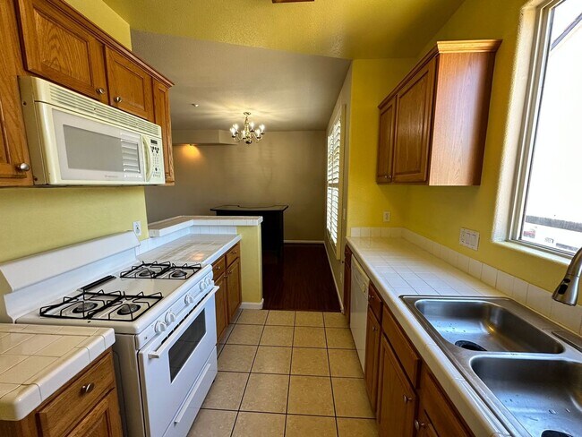Building Photo - Gated Hayward Townhome with 2-Car Garage & Private Patio