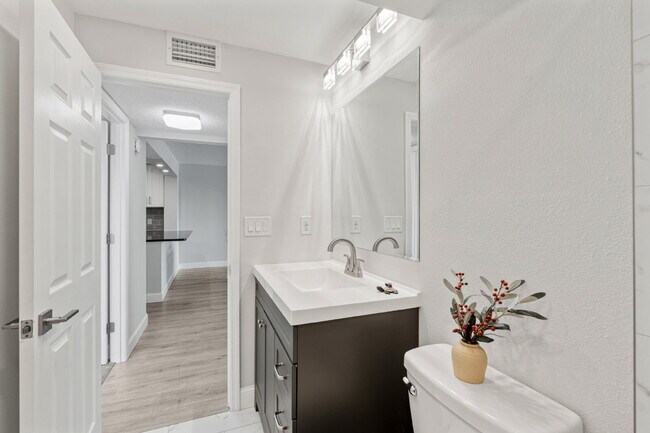 Building Photo - NEWLY RENOVATED TWO BEDROOM CONDO IN WATERFRONT RESORT STYLE COMMUNITY