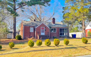 Building Photo - Carrboro Cool! Unique 4 bedroom house with...