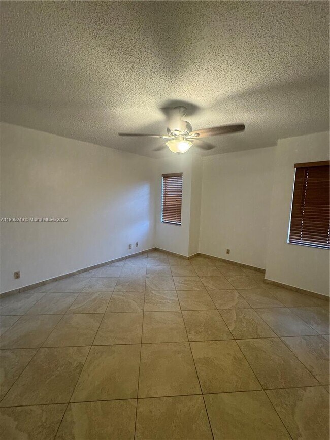 Building Photo - 3111 Coral Springs Dr