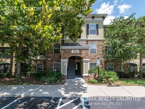 Building Photo - 10211 Courtney Palms Blvd