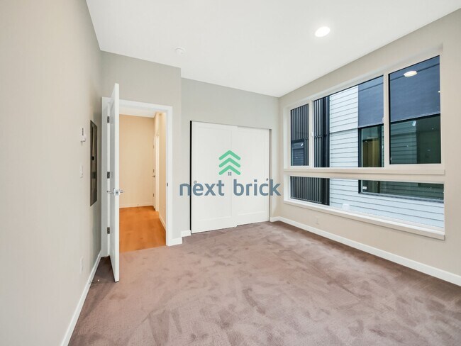 Building Photo - Stunning 2023-Built Crown Hill Townhome | 3 Bed | 2 Bath | Modern Finishes & Prime Seattle Location