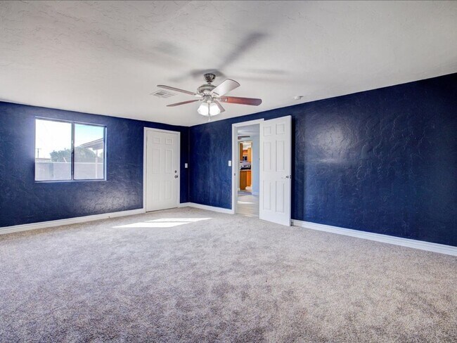 Building Photo - Spacious 4-Bedroom, 2-Bath Home with Extended Driveway & Large Backyard