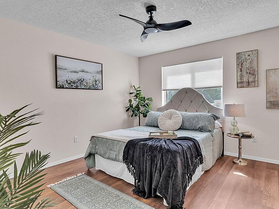 Building Photo - Single-level living at its finest! This co...
