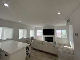 Living Room with gas / wood burning fireplace - 221 36th Pl