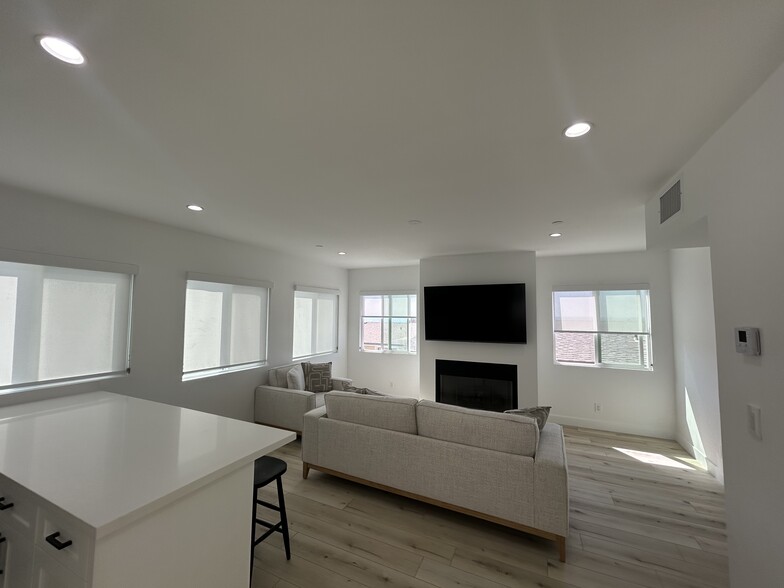 Living Room with gas / wood burning fireplace - 221 36th Pl