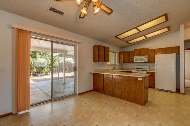 Building Photo - Nice three bedroom two bath home in PV!