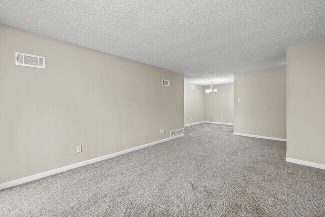 Chesterfield Place Apartments | 2 BR Remodel With Washer & Dryer | Living & Dining Space - Chesterfield Place Apartments