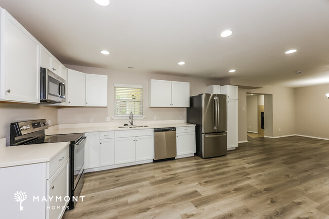 Building Photo - Laid-Back Living with Modern Finishes in H...
