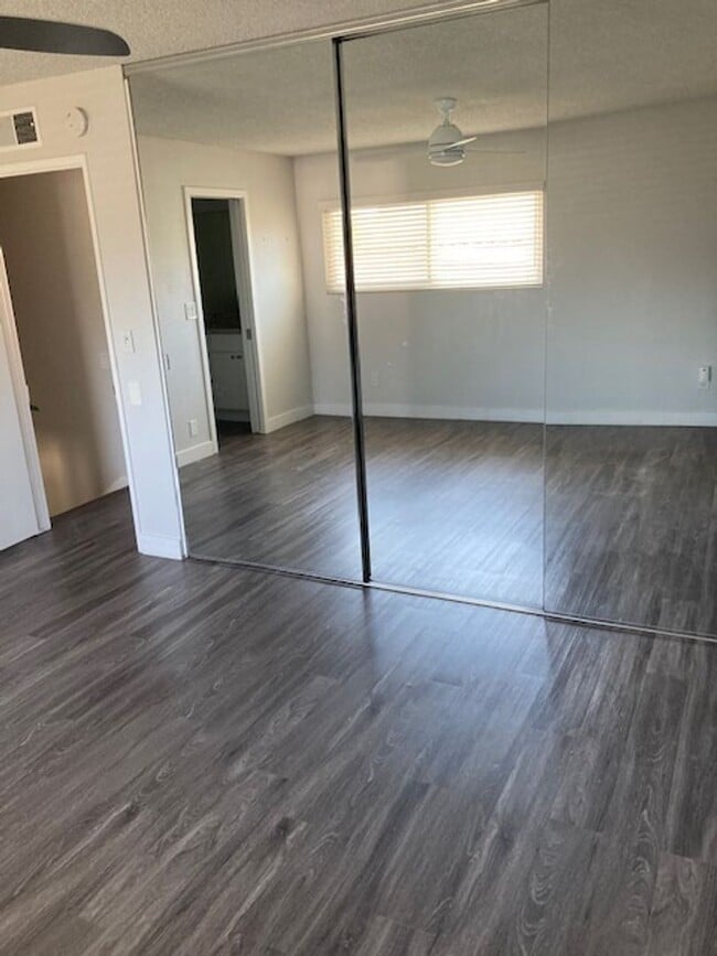 Building Photo - OUTSTANDING 4 BEDROOM HOME IN GATED COMMUNITY