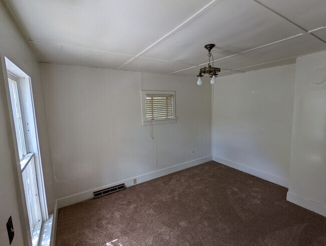 Building Photo - Centrally Located Home on Corner Lot with Small Pets Considered