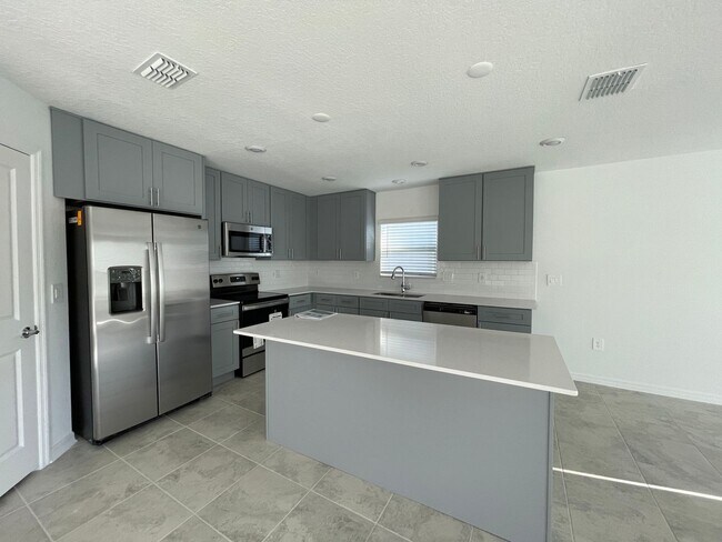 Building Photo - BEAUTIFUL BRAND NEW 2022 Home in the new S...