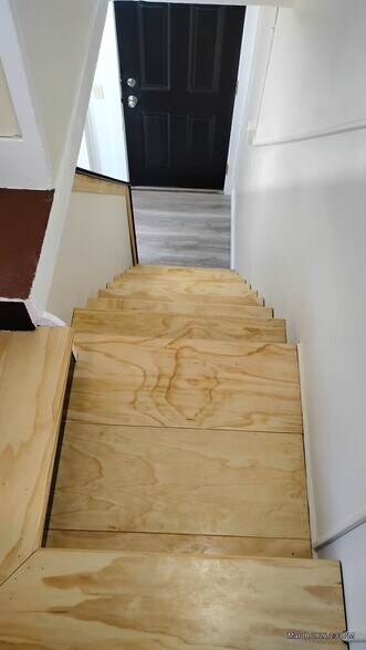 View down from top of stairs. - 44 Coolidge St