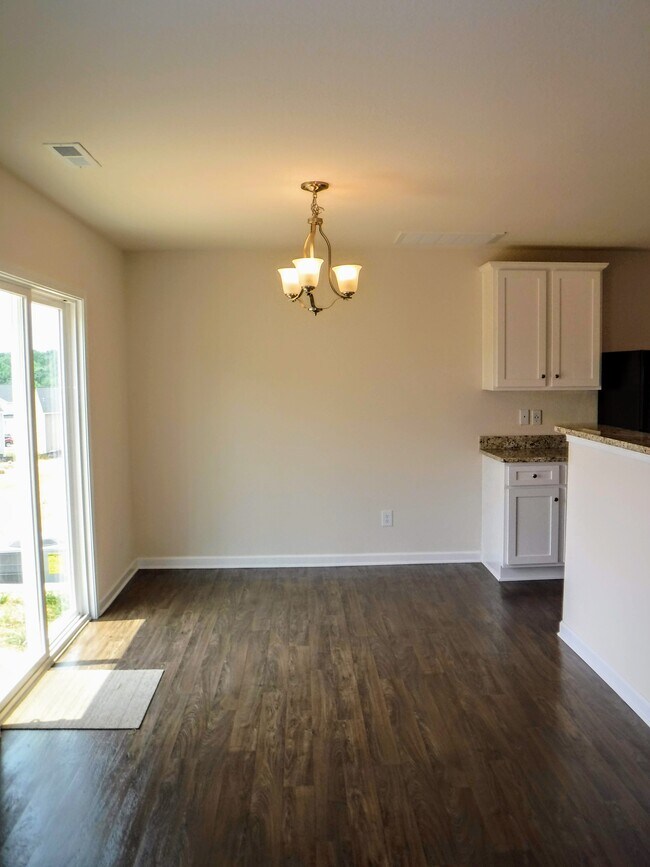 Dining room with access to extended patio area - 2022 Talbert Ct