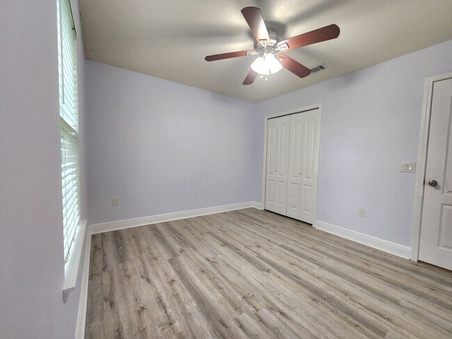 Building Photo - Welcome to your 4/2 dream home in Pace Mil...