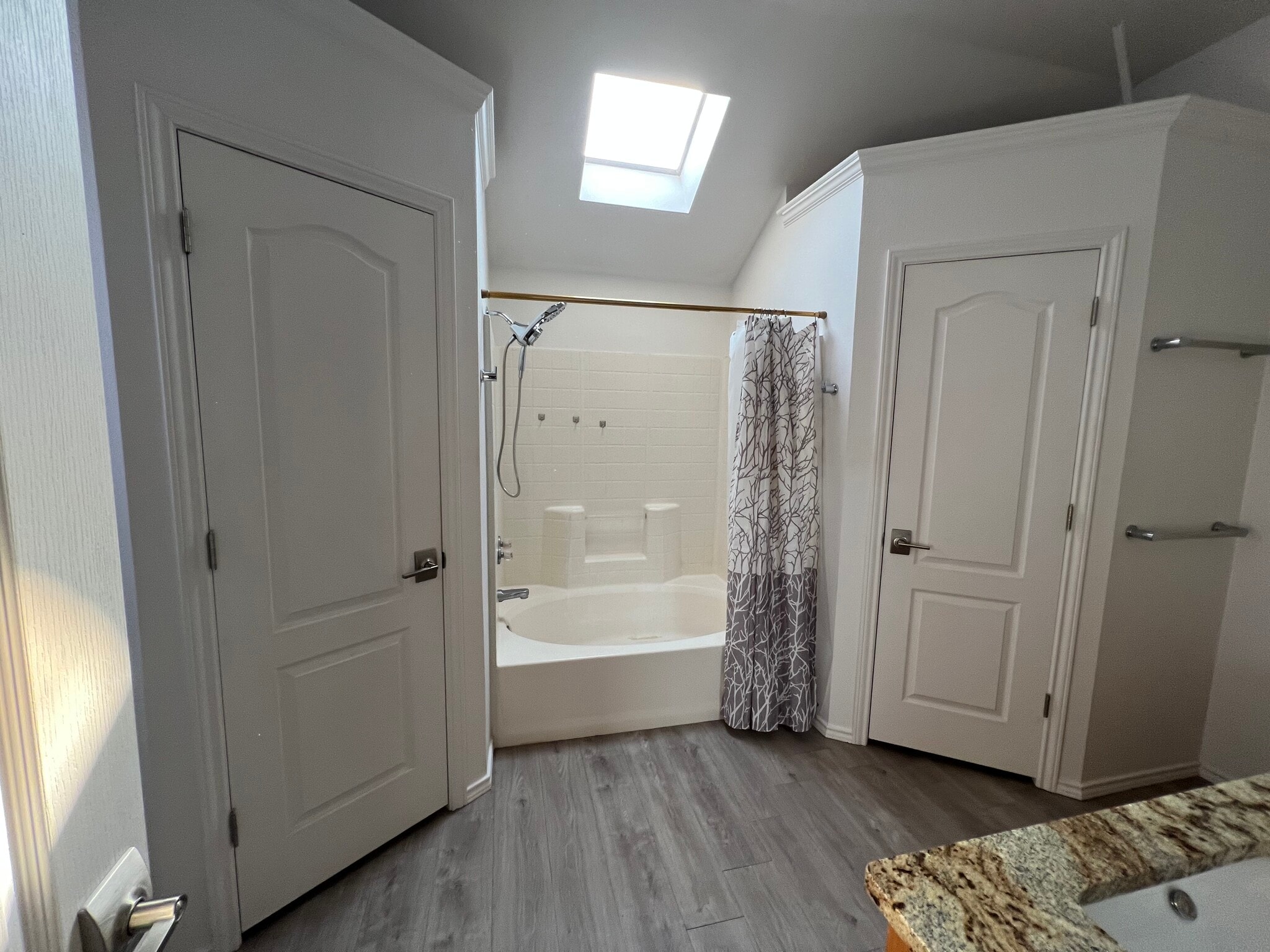Garden tub has been replaced with granite walk-in shower with glass door - 8009 Thompson Pky