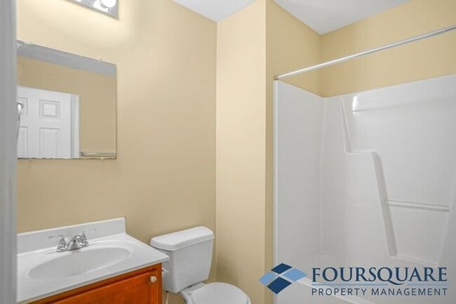 Building Photo - Charming 3-Bedroom Townhome with First-Floor Suite & Off-Street Parking – Near Capital Blvd & I-440