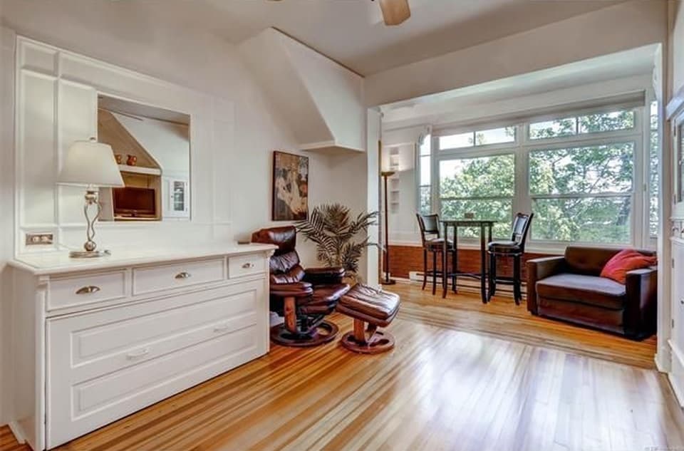 Bright and sunny studio penthouse with beautiful hardwood floors and built in cabinets - 726 East 16th Avenue