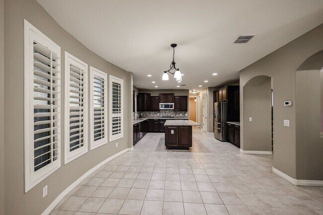 Building Photo - COMING SOON! Great Location!Stunning 6-bedroom Plus 7, 4.5-bathroom home located in Chandler