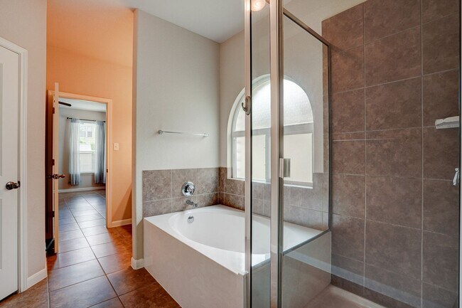 Building Photo - Bright & Roomy 4BR • 2.5BA • Two-Level Living