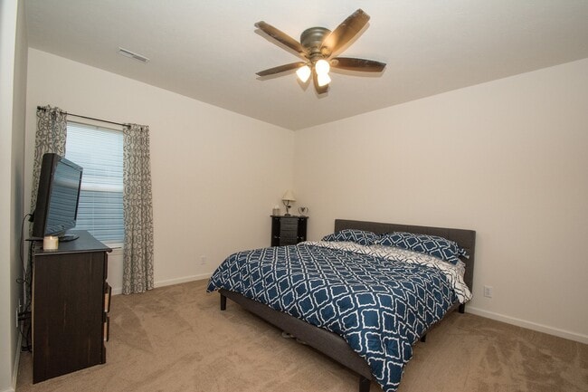 Building Photo - House with Fenced Backyard