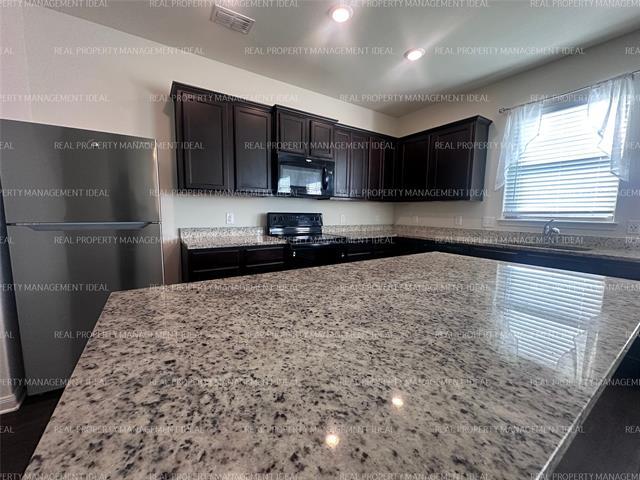 Building Photo - 14310 Wrangler Wy