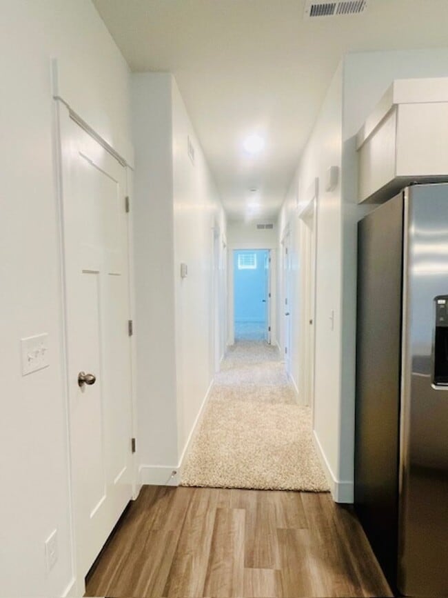 Building Photo - Brand-new Condo Conveniently Located in Ri...