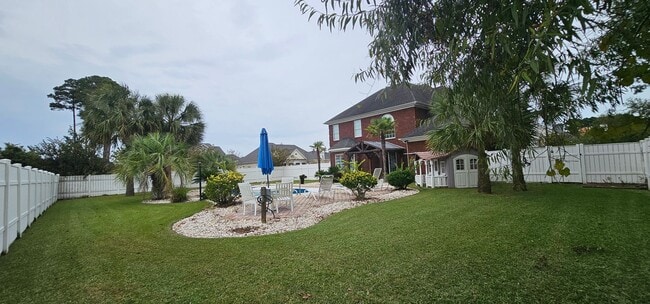 Building Photo - “Elegant 5-Bed Executive Home with Pool – ...