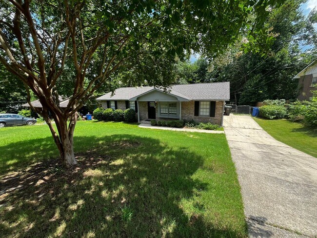 Building Photo - Must See the Sunroom off the Primary Bedroom!