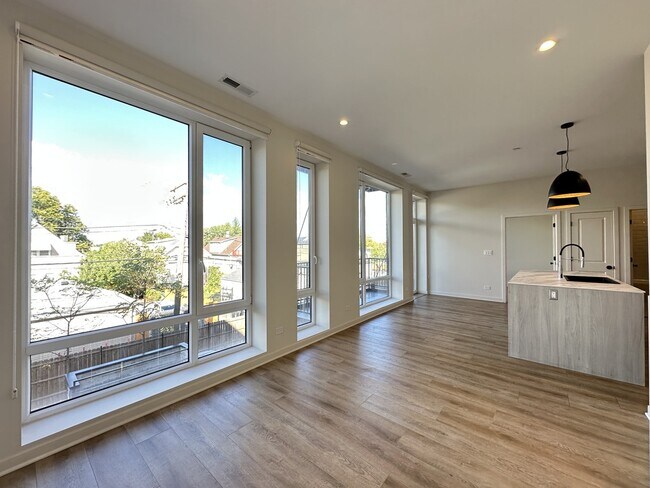 Building Photo - 6340 W Belmont Ave