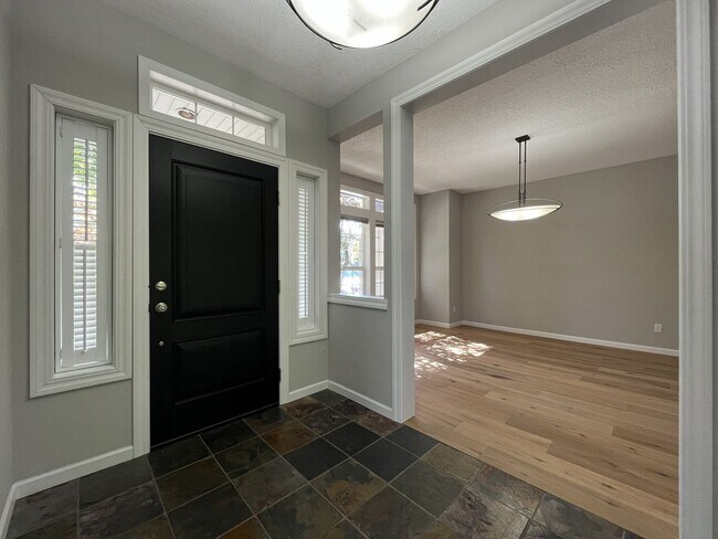 Building Photo - Beautifully Updated 3-Bedroom Bethany Home with Chef's Kitchen, Huge Bonus Room and Private Backyard