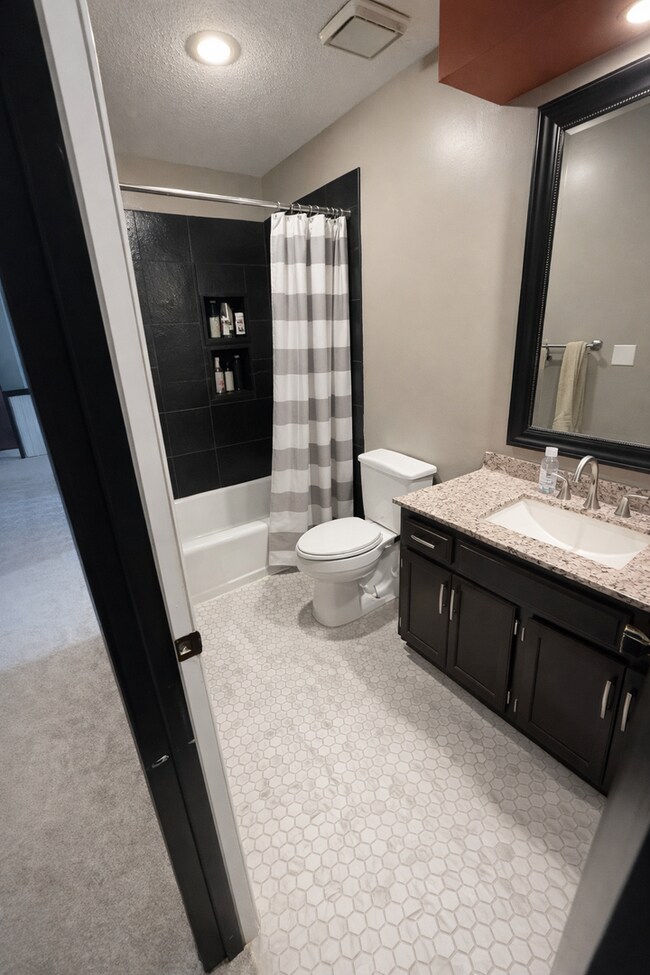 Building Photo - 4 Bed Lenexa Home w/ Finished Basement, Solar, 3 Car Garage and Fenced Yard!!