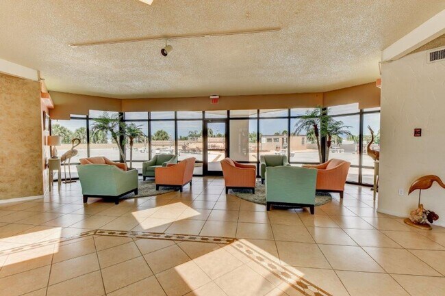 Building Photo - Furnished 3rd Floor Condo Overlooking The Golf Course