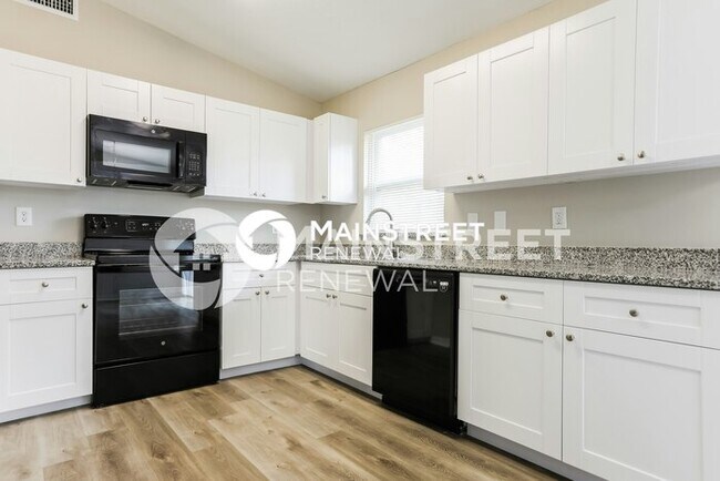Building Photo - 3 Bedroom Pet-Friendly Home in PORT CHARLOTTE, FL with Main Street Renewal
