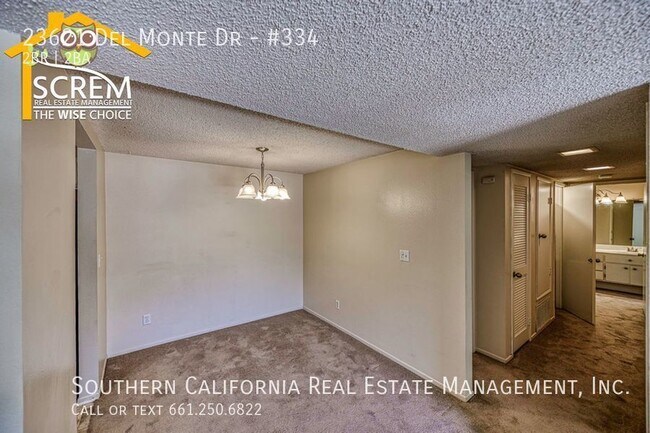 Building Photo - Nicely Upgraded Upper Two Bedroom Condo in...