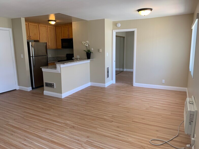 Light + bright! Spacious + brand new floors! - 220 S La Fayette Park Pl