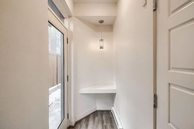 Building Photo - Modern LoHi Living with Rooftop Deck & City Views!!