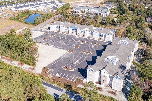 Building Photo - Beacon Landing - Brand New! 2bd, 2ba, private extra large screened porch and elevator!