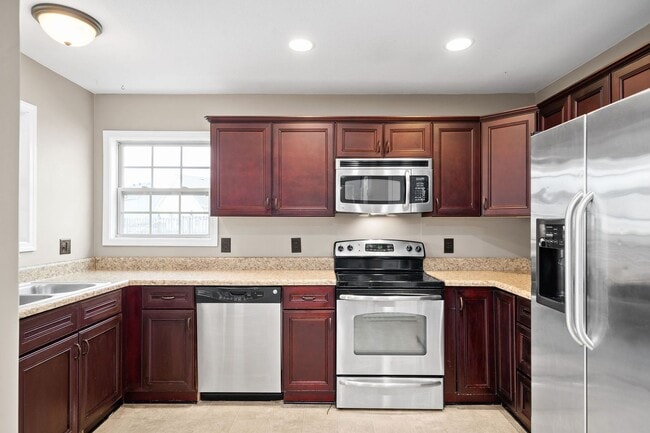 Building Photo - Pet Friendly Three Bedroom with Bonus!