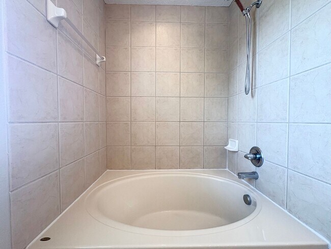 Building Photo - Gated 3B/2.5B Sanford Townhome ~ Fresh paint! ~ New flooring!