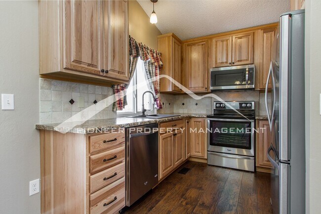 Building Photo - Split-level Home With Fenced Backyard and 2 Large Decks!