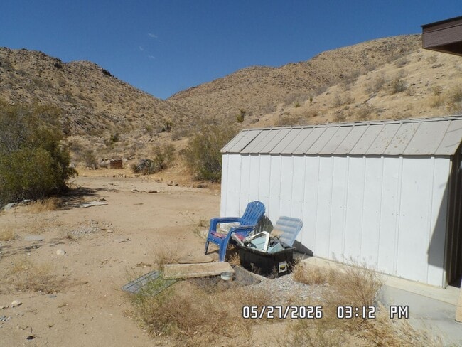 Building Photo - 2 Bedrooms, 1.5 Bathrooms, 2 Car Garage, 973 sq. ft., View of Victor Valley, Storage Shed
