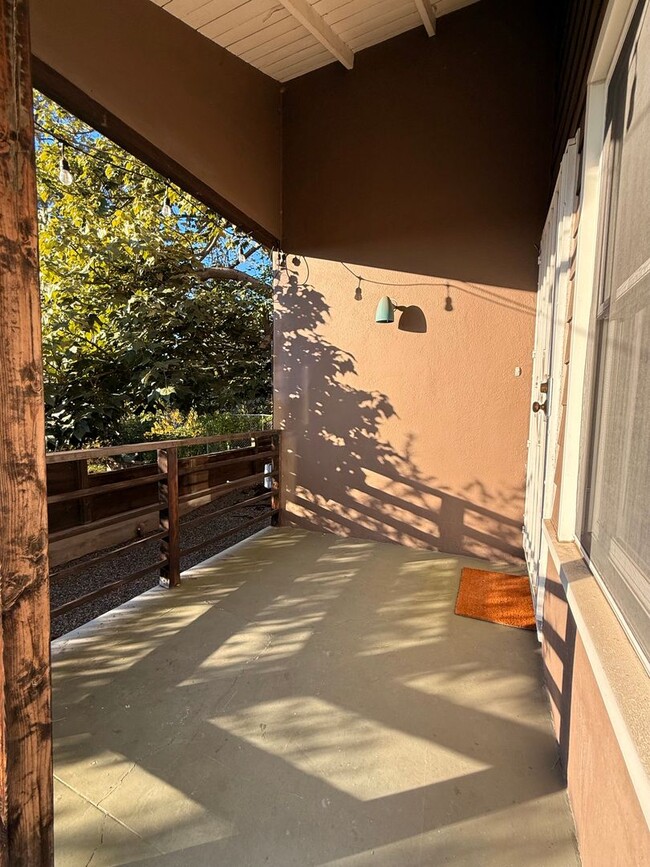 Building Photo - Hilltop Highland Park Sanctuary with Views, Private Gated Yard, In Unit Laundry, Parking & Abunda...